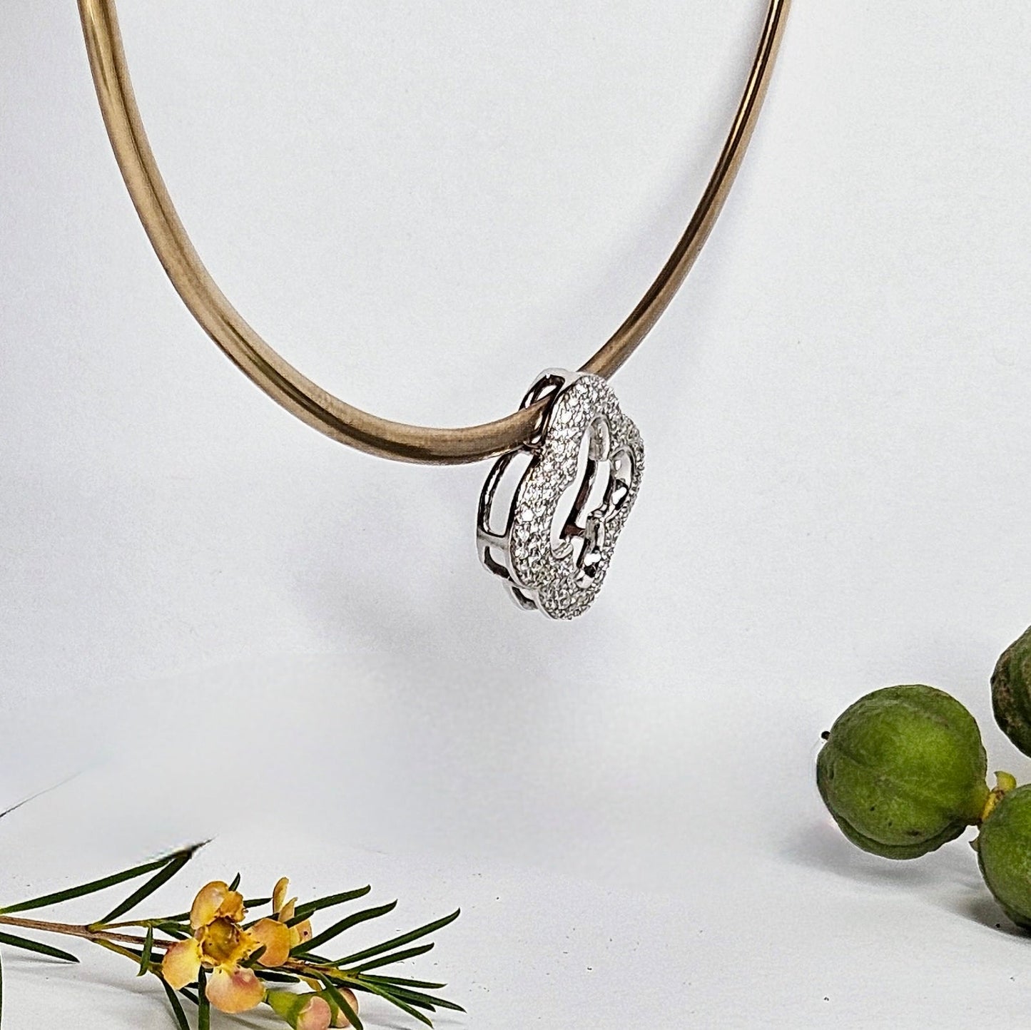 Clover shaped, bead set Diamond pendant