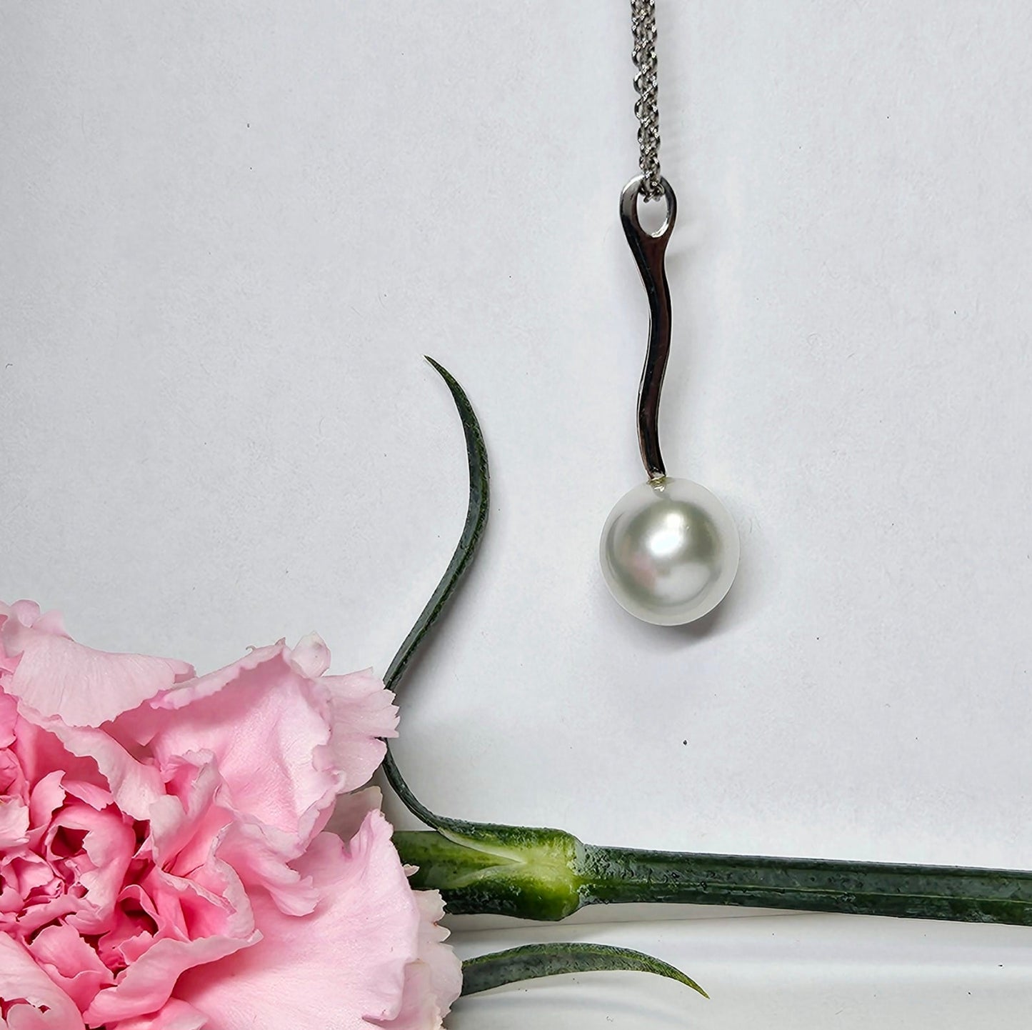 Pearl and Diamond channel set bar drop pendant