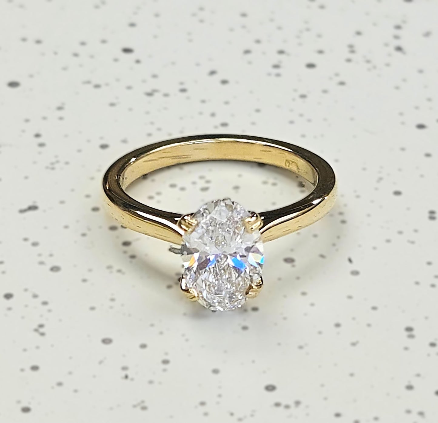 Four Claw Oval Tulip Engagement Ring