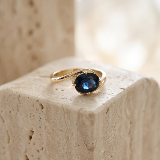 Sweeping Sapphire Ring
