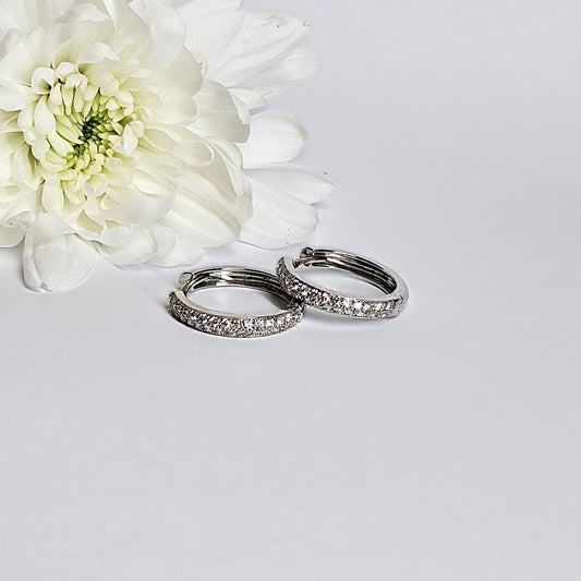 Pave Diamond set huggie style earings