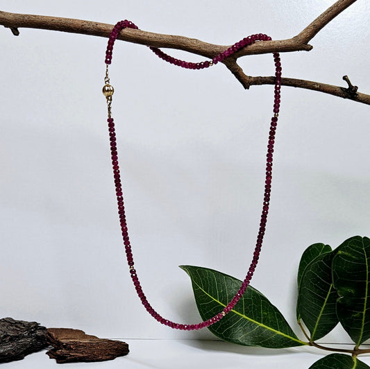 Ruby facetted bead necklet with gold spacers