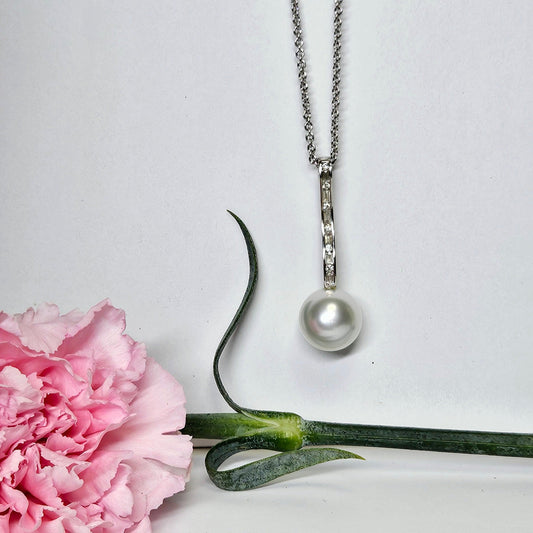 Pearl and Diamond channel set bar drop pendant